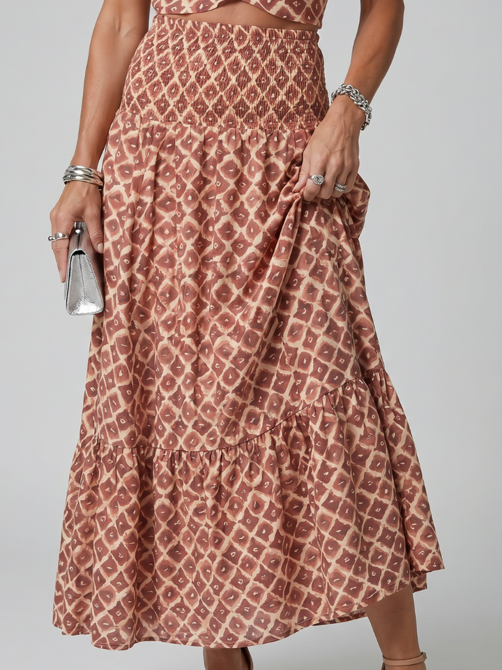 Amira | Abito Midi con Scollo Halter Incrociato e Stampa Geometrica