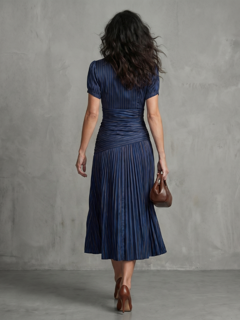 Theodora | Vestito midi a righe con vita plissettata