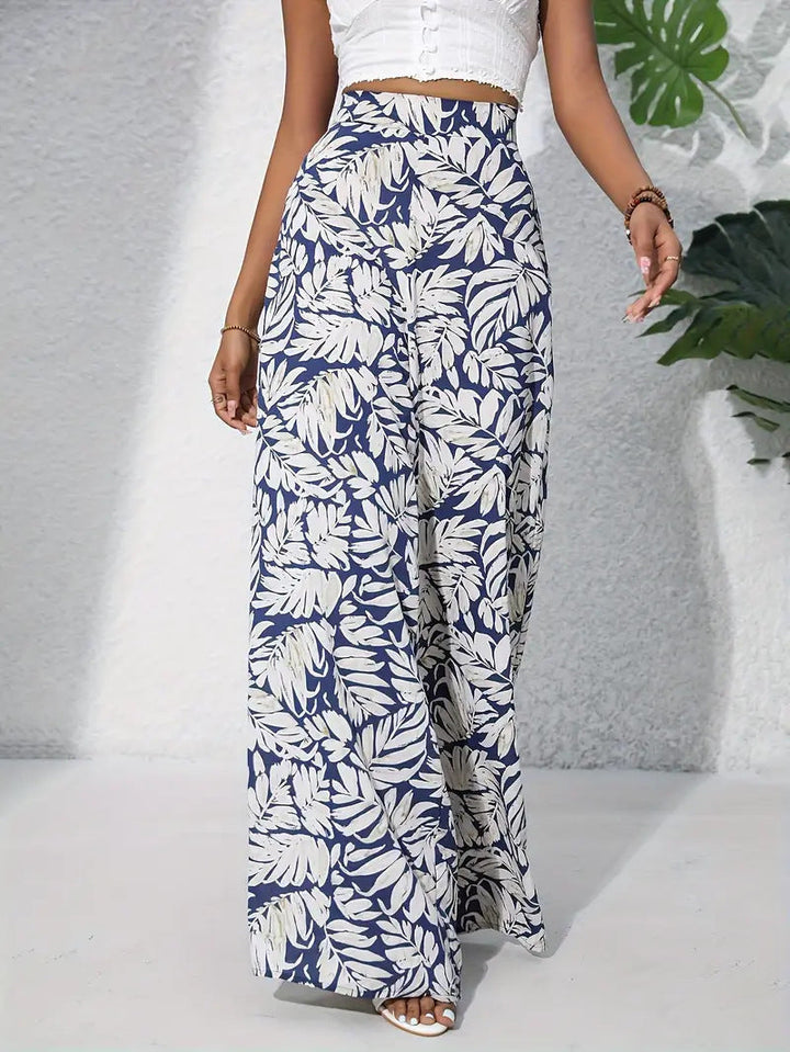 Pantaloni Ampi a Fiori Leggeri con Vita Alta