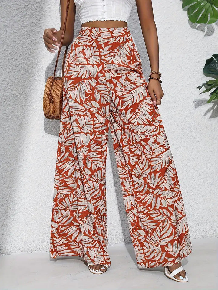 Pantaloni Ampi a Fiori Leggeri con Vita Alta