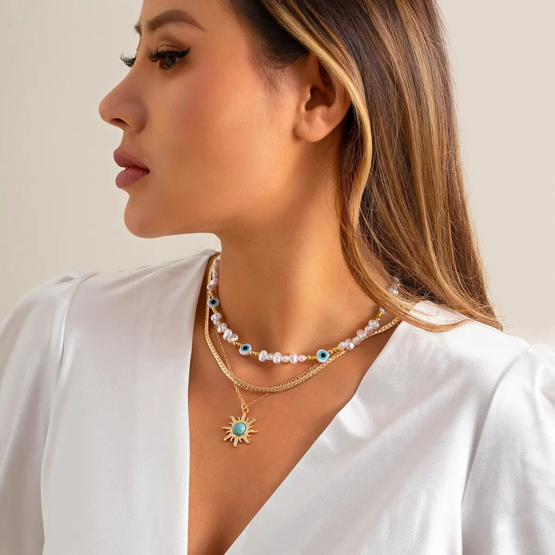 Collane a Strati Parel e Occhio Maligno con Ciondolo Sole Boho