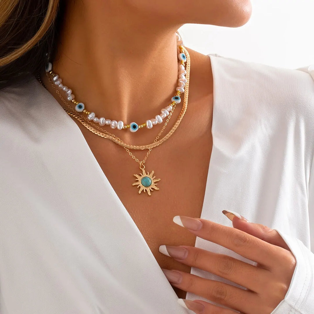 Collane a Strati Parel e Occhio Maligno con Ciondolo Sole Boho