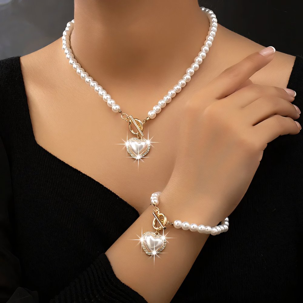 Set di 2 pezzi: bracciale e collana con pendente a cuore in perline