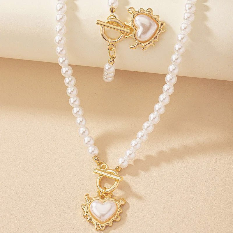 Set di 2 pezzi: bracciale e collana con pendente a cuore in perline