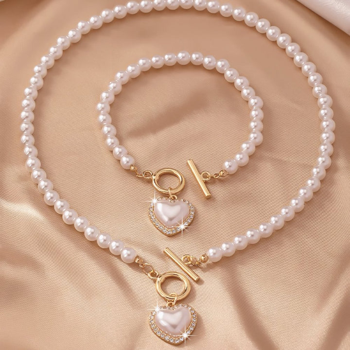 Set di 2 pezzi: bracciale e collana con pendente a cuore in perline